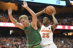 Tyus Battle goes up with the ball against Notre Dame. The Orange battled hard, but couldn't recover from an early second half scoring explosion by the Cavaliers.