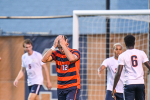 John-Austin Ricks reacts after missing a shot late in the game against Virginia.